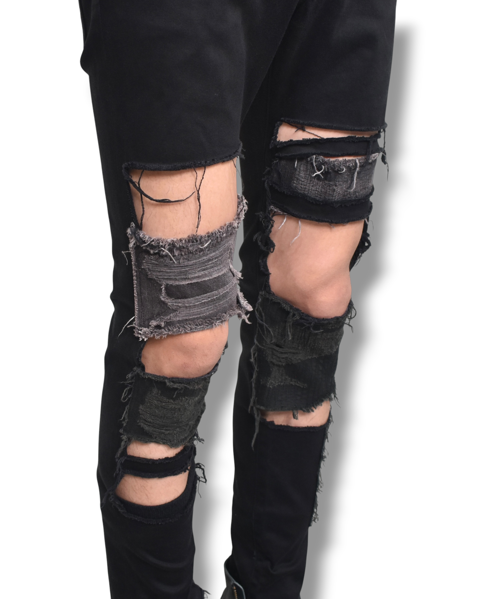 UNDERCOVER crashed skinny denim pants